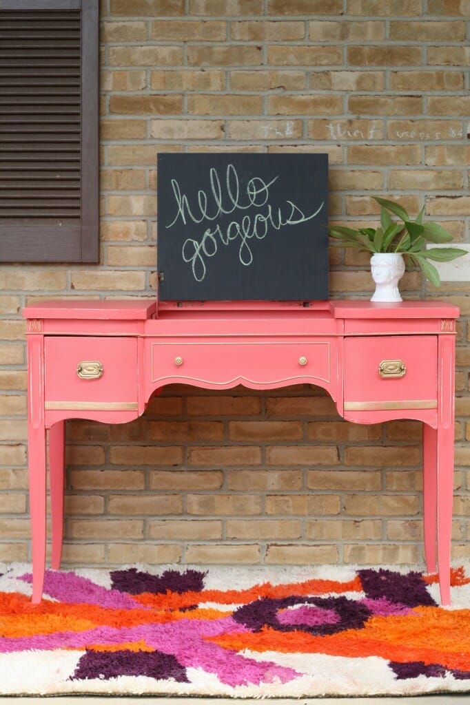 gilded coral crush vanity with chalkboard