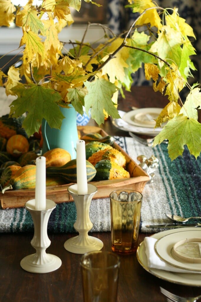 bohemian thanksgiving table with natural touches, vintage finds, mexican blanket