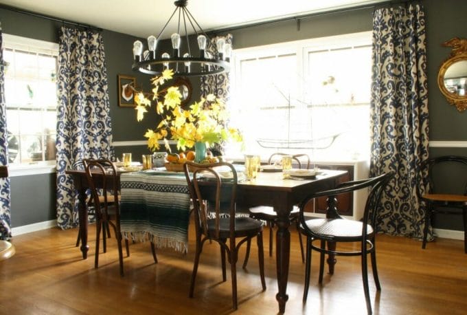 moody dining room set with warm natural bohemian thanksgiving table