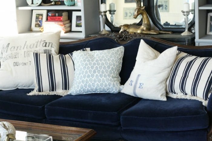 Navy Velvet Sofa with Grain sack pillows