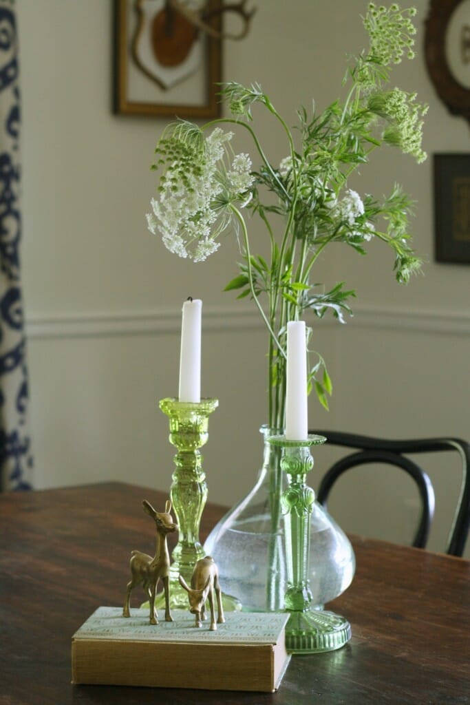 Green glass, and greens on dining table