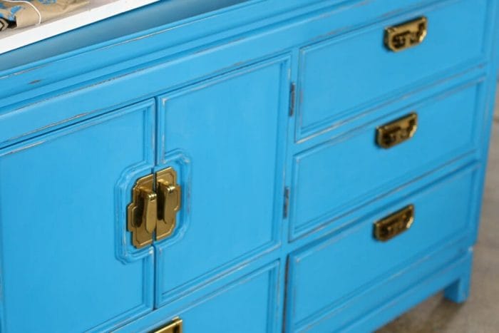 awesome vintage hardware on blue vintage dresser