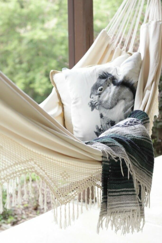 Fall hammock with squirrel pillow and Mexican blanket