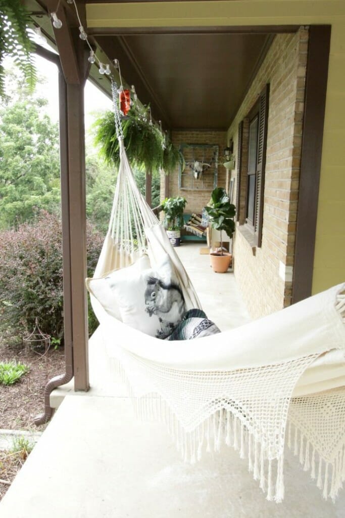 Fringe Hammock with Squirrel pillow on Fall Porch