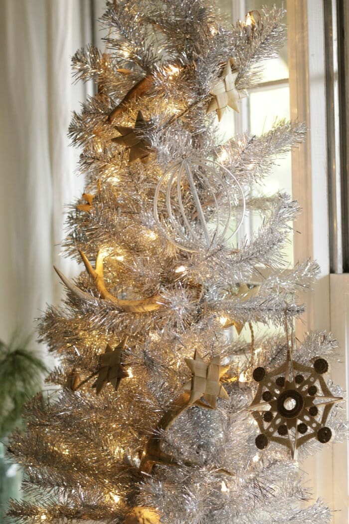 Tinsel Tree in dining room with natural decorations