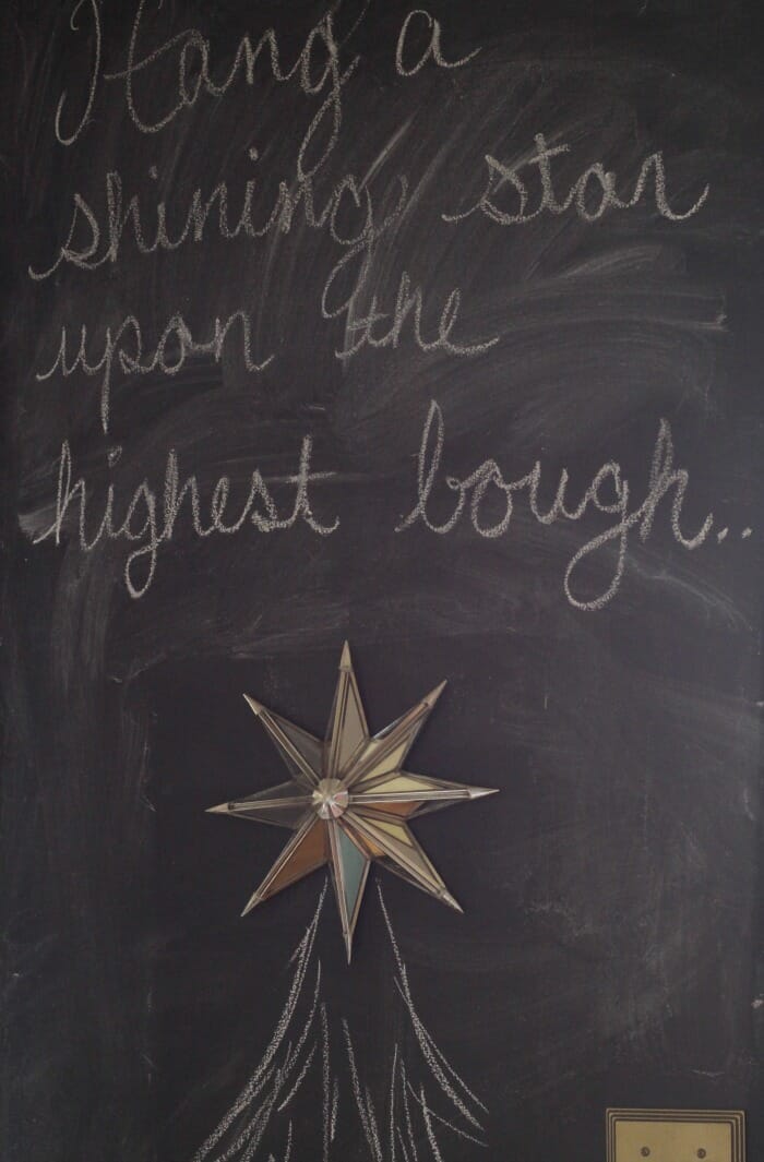 Mirrored star on chalkboard wall christmas tree