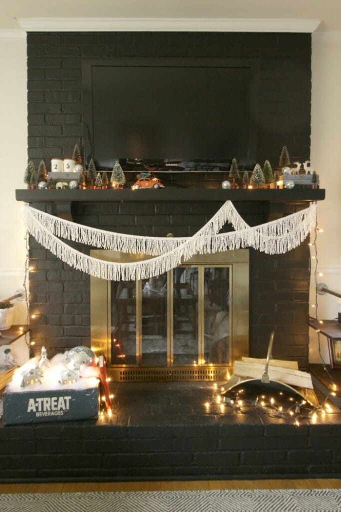 Eclectic Black Christmas Mantle with Fringe and Vintage Bottle Brush Trees