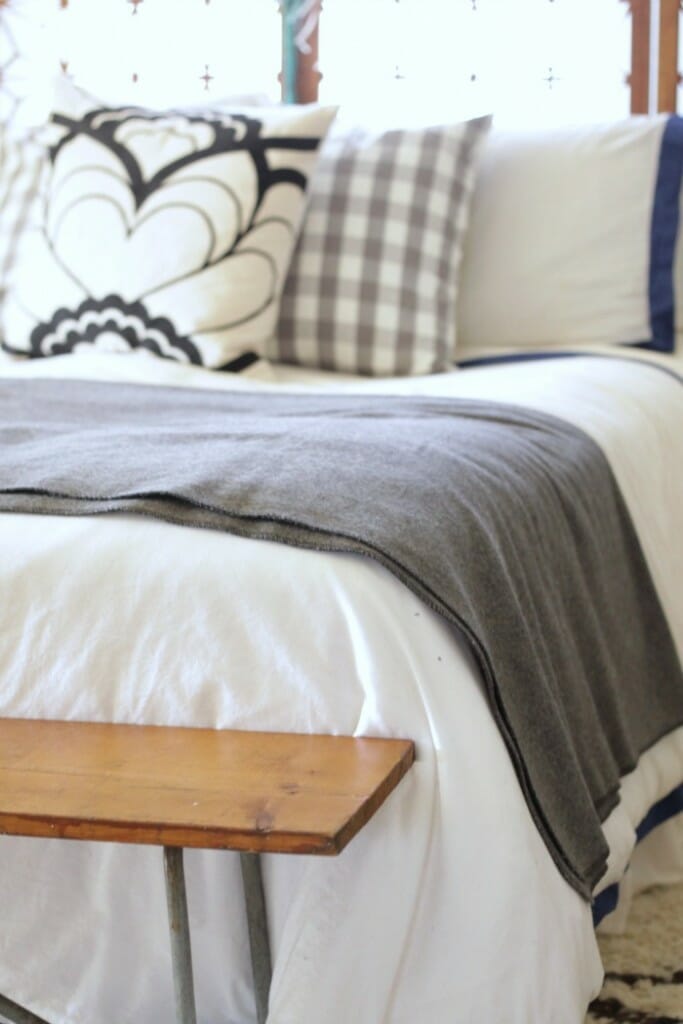 gray wool blanket on bed