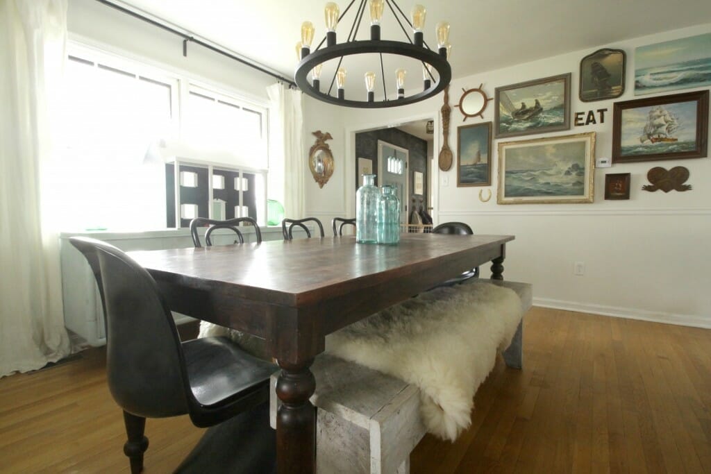 Eclectic Dining Room with Nautical gallery Wall