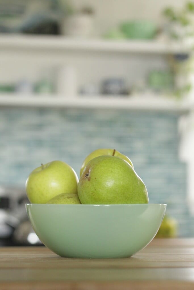 Jadeite bowl with golden delicious apples and pears