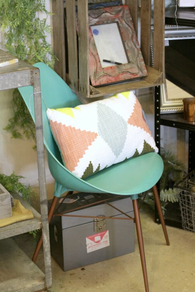 Teal shell chair at Sweet Clover