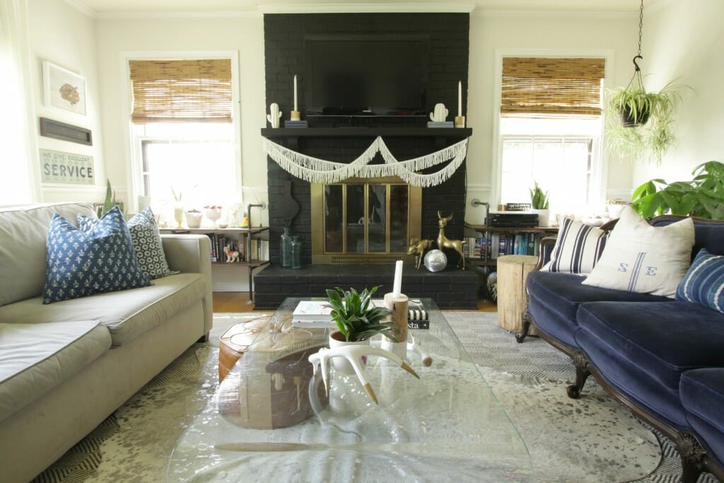 Eclectic Modern Boho Living Room- Vintage Navy Velvet Sofa, Black fireplace