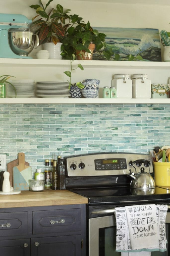 kitchen-with-open-shelving-blues-greens-plants