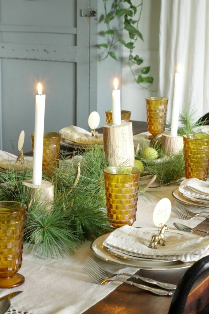 Natural Rustic Holiday Table with Pears, Pine, Antlers