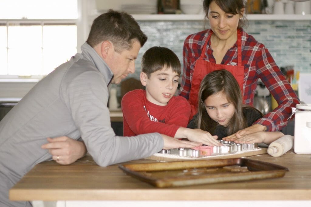 Family Cutting Cookies Together