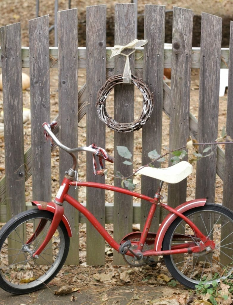 vintage-red-bike-at-gate