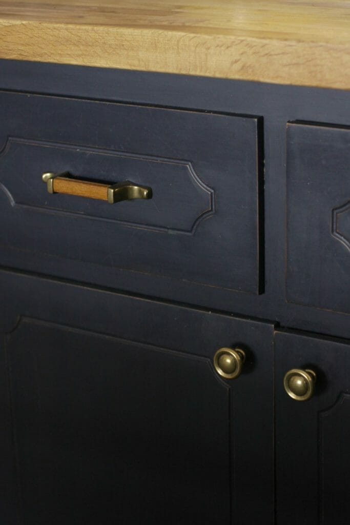 Wood and Brass Knobs and Pulls with Navy Cabinets