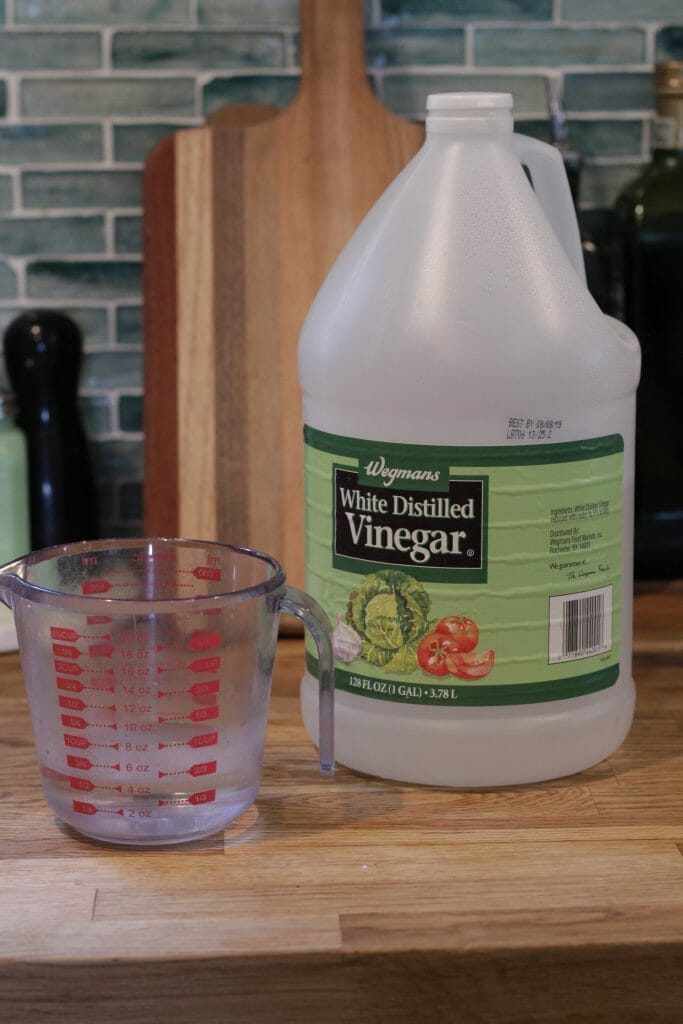 Distilled Vinegar and water to remove odors.