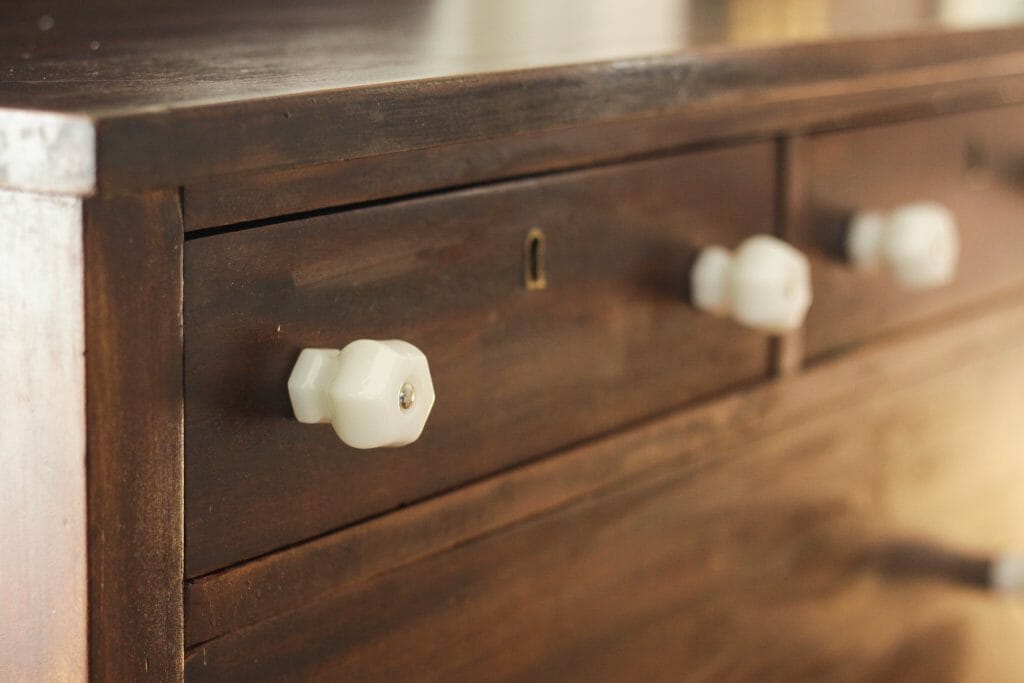 Chunky Milk Glass Knobs Paired with wood Dresser