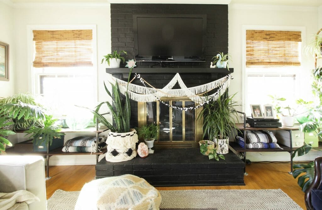 Black painted fireplace with DIY built ins