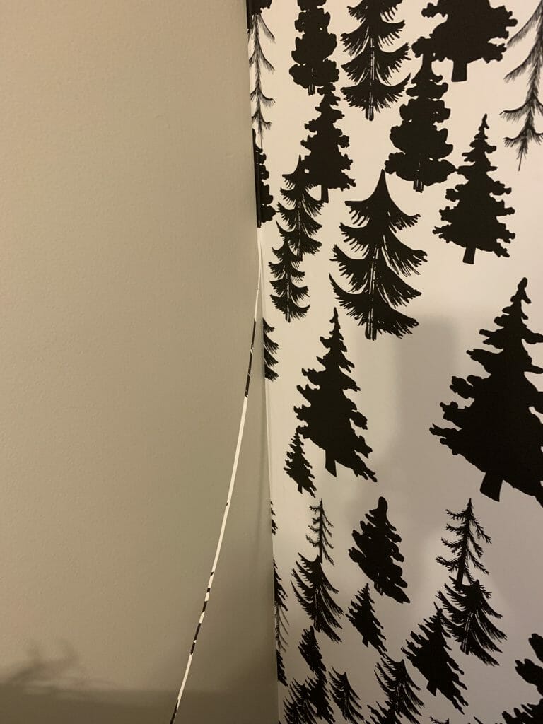 Trimming edges of wallpaper