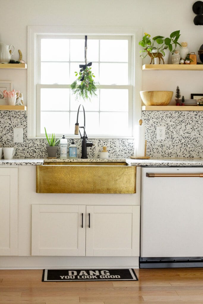 Eclectic Kitchen with brass sink