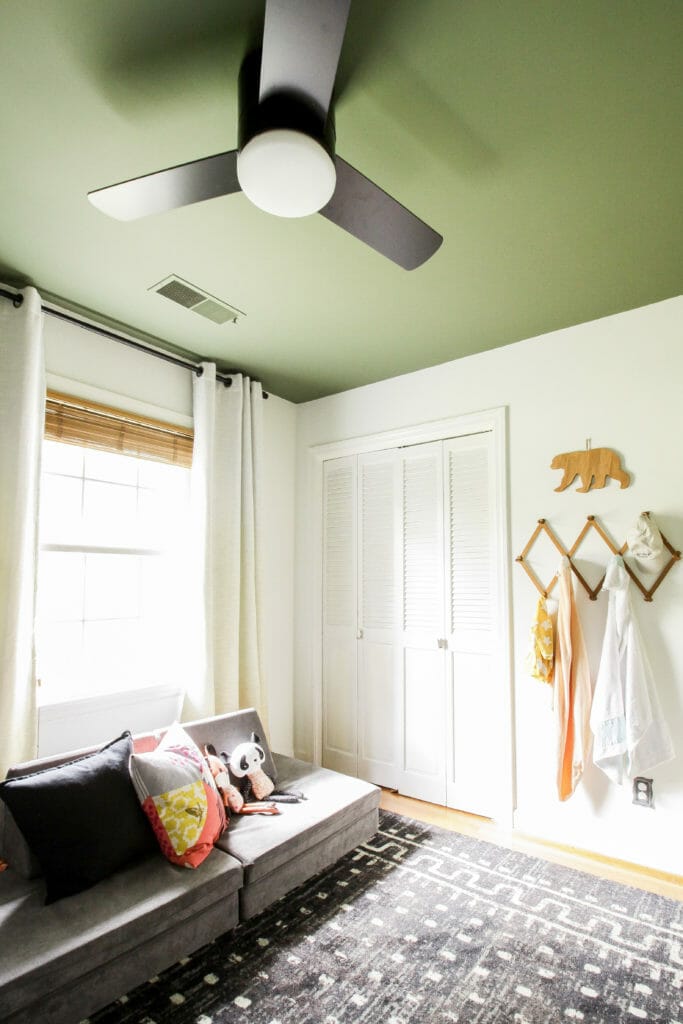 neutral nursery with green ceiling