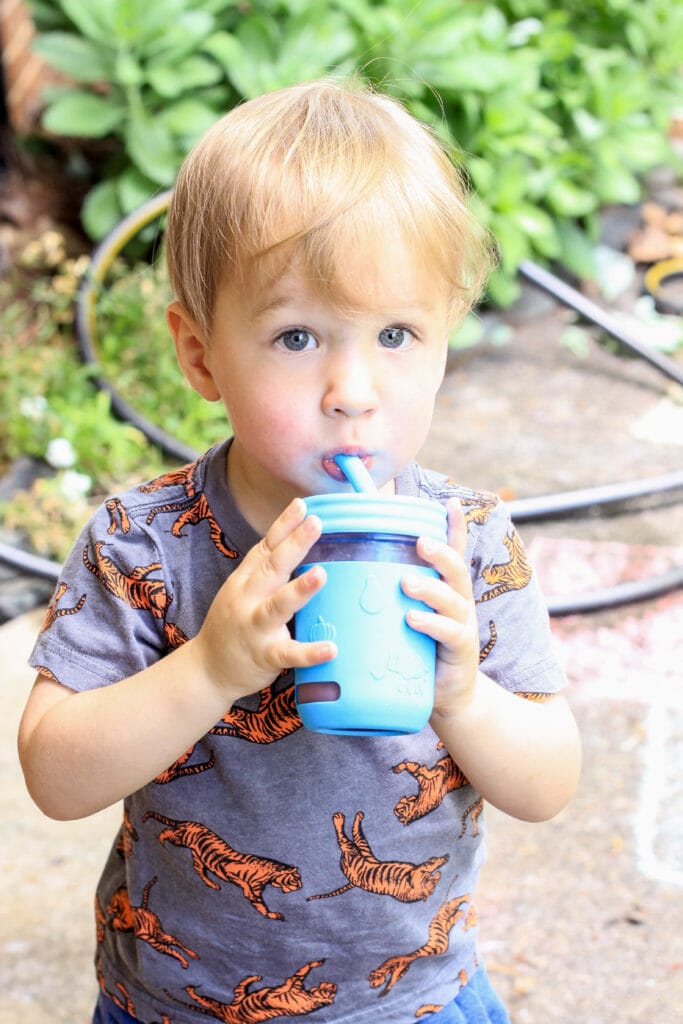 toddler with slushy drink