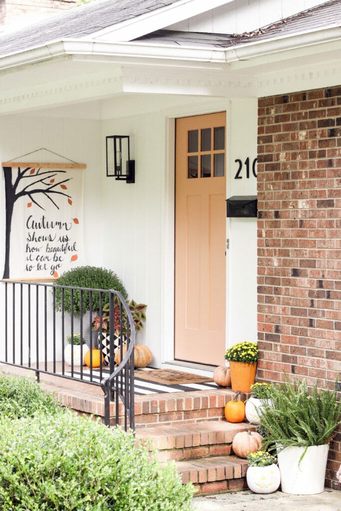 Cheerful small fall front porch