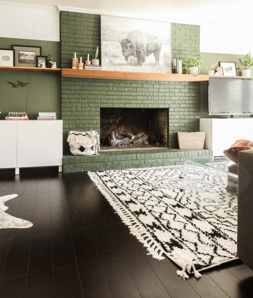Modern boho family room in white and black, naturals and greens