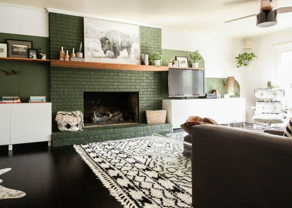 Modern boho family room in white and black, naturals and greens