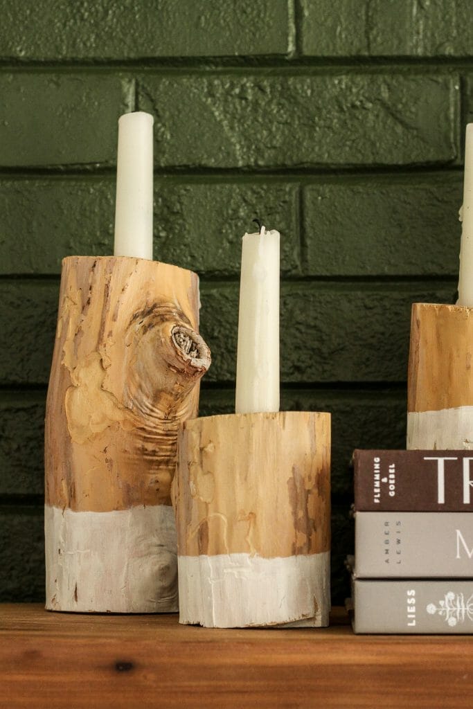 Modern boho mantel with rustic wooden candle holders